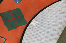 Load image into Gallery viewer, UNALLOYED Argyle Circle Rug Orange