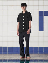 Load image into Gallery viewer, UNALLOYED Button Flower Half Shirt Black
